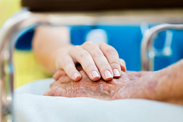 istock Care For Elderly in Wheelchair 176649297