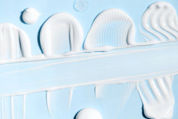 istock cosmetic smears cream texture on pastel blue background 1766494036