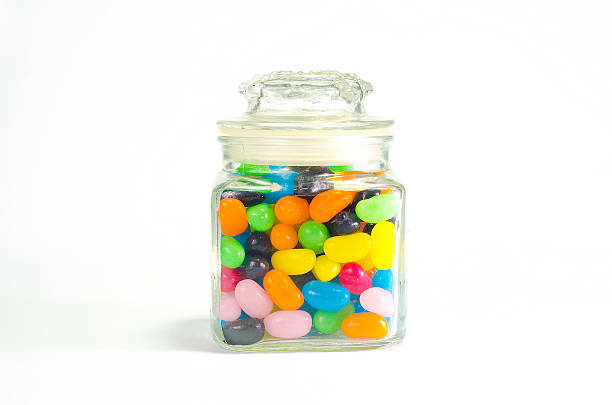 istock Jelly beans sugar candy snack in a jar isolated 176650705