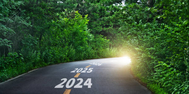 Summer asphalt curvy road with new year numbers 2024,2025 and 2026 stock photo