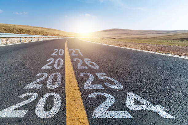 Empty asphalt highway with new number 2024, 2025, 2026 and 2027 stock photo