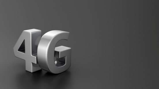 Metal letters 4G on black background with copyspace