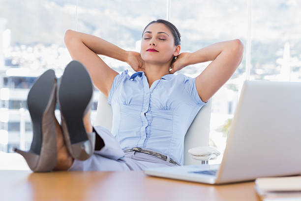 istock Attractive businesswoman relaxing in her office 176651298