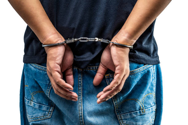 istock Arrested man with a handcuff on his hand 1766518076