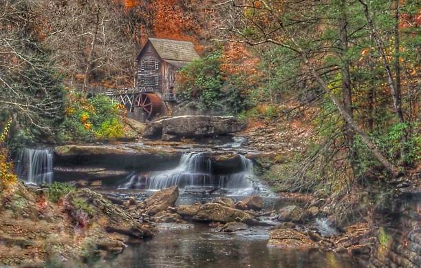 просека ручей grist mill - autumn watermill glade creek waterfall стоковые фото и изображения