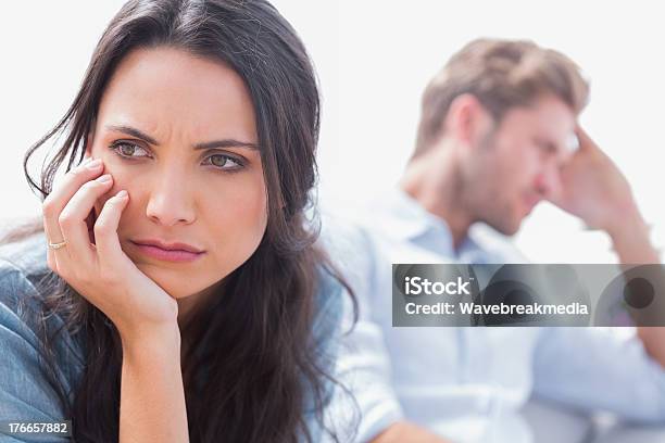 Annoyed Woman Holding Her Head Stock Photo - Download Image Now - Adult, Anger, Anxiety