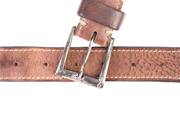 istock Fradment of brown belt and buckle. 176660862