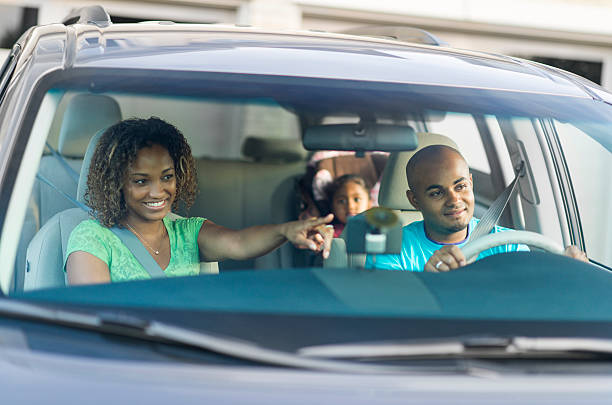 Family Roadtrip African American family on a roadtrip family-van-driving stock pictures, royalty-free photos & images