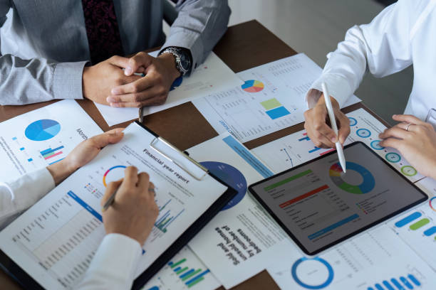 istock Business people teamwork with analysis cost graph on desk at meeting room 1766612741