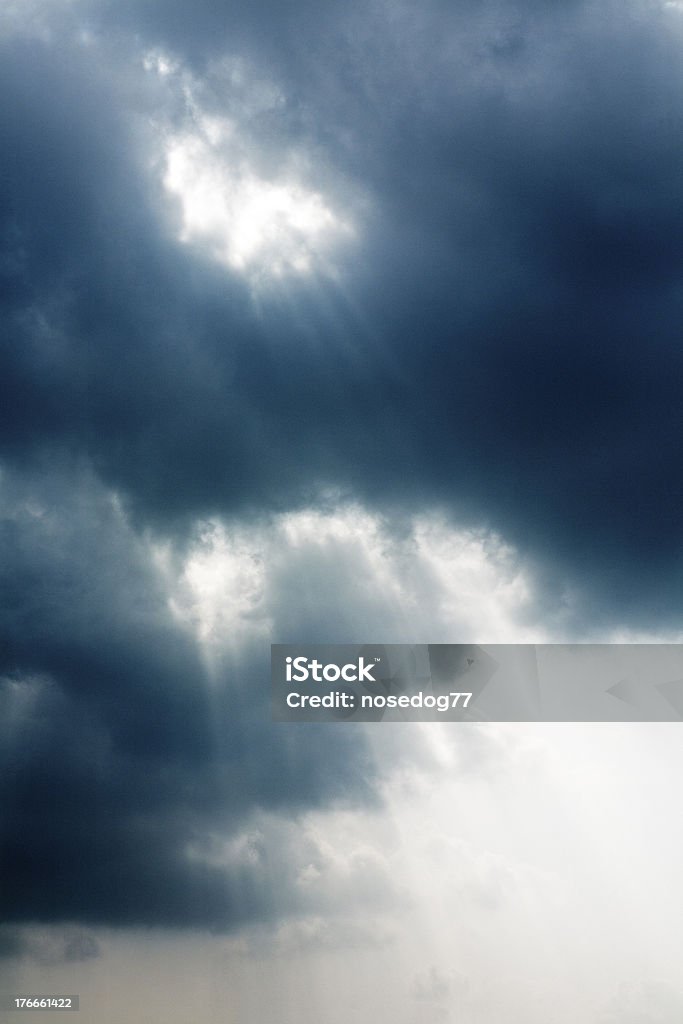 Sunlight(Sunbeams) Blue sky and sunlight coming through the cloud Abstract Stock Photo