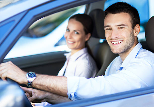 istock Man and woman driving 176664514