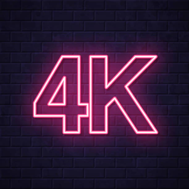 istock 4K, 4000 - Four thousand. Glowing neon icon on brick wall background 1766667400