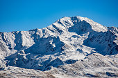 Snowy Mountain Pischahorn in Swiss Alps, Silvretta Alps, located east of Davos, in the Swiss canton of Graubuenden, Switzerland
