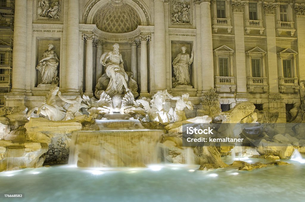 Trevi Fountain Trevi Fountain illuminated at night, Rome, Italy Arch - Architectural Feature Stock Photo