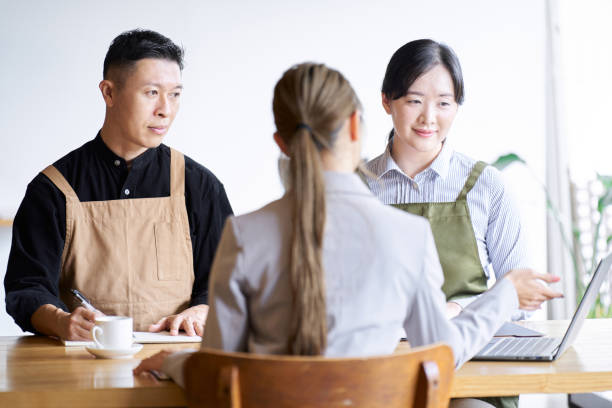 istock Restaurant manager listening to businesswoman's presentation 1766695162