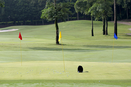 Focus scene on golf activity in golf course