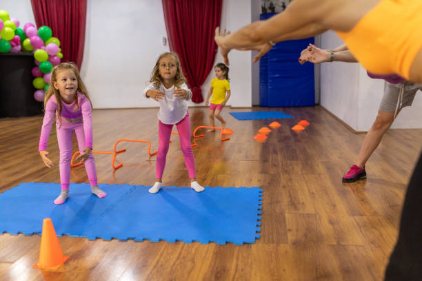 istock Little girls stretching in dance studio 1766713472
