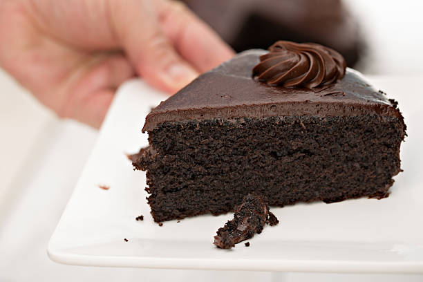 Chocolate cake with a piece missing.