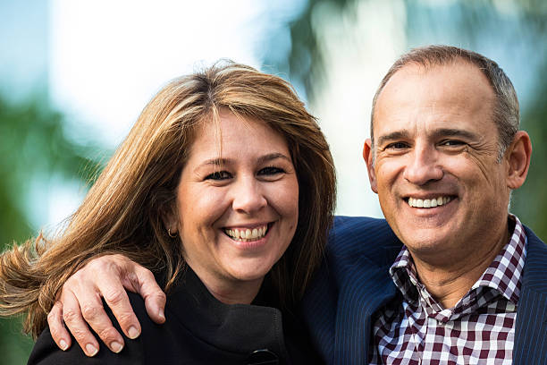 istock and man and a women smiling beautifully 176672646