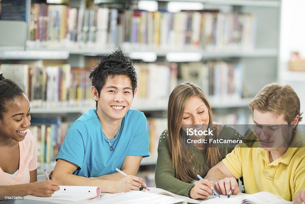 University Students University students studying in the library 20-24 Years Stock Photo