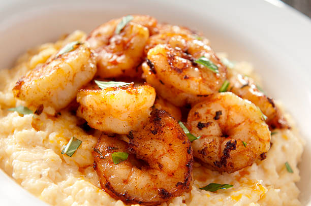Shrimp and Cheese Grits Shrimp and cheese grits - southern cuisine.  Please see my portfolio for other food and drink images. char grilled photos stock pictures, royalty-free photos & images