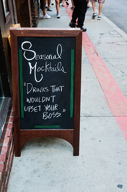Sidewalk sign outside a restaurant along Boston's freedom Trail
