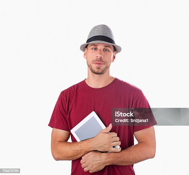 Foto de Homem Bonito Com Chapéu Huging Tablet Pc e mais fotos de stock de Computador - Computador, Dispositivo de informação portátil, Espaço para Texto