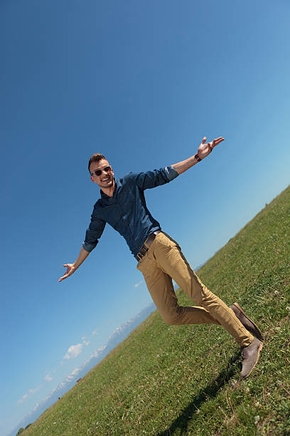 istock outdoor casual man raising his shoulders 176675963