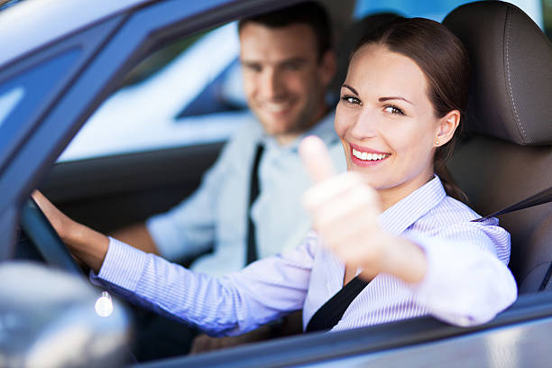 istock Couple sitting in car with thumbs up 176676011