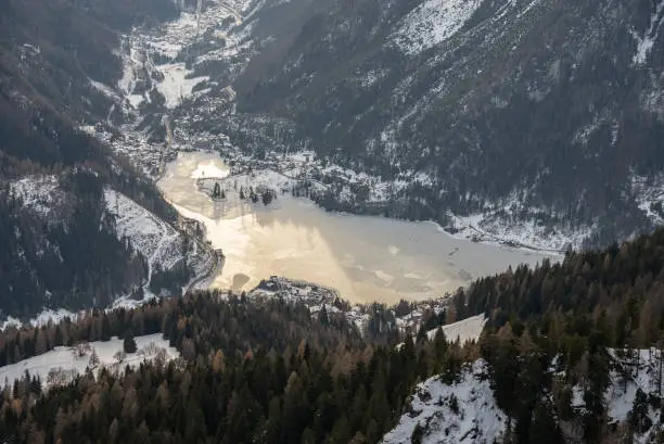 Civetta resort. Panoramic view of the Dolomites mountains in winter, Italy. Ski resort in Dolomites, Italy. Aerial view of ski slopes and mountains in dolomites.