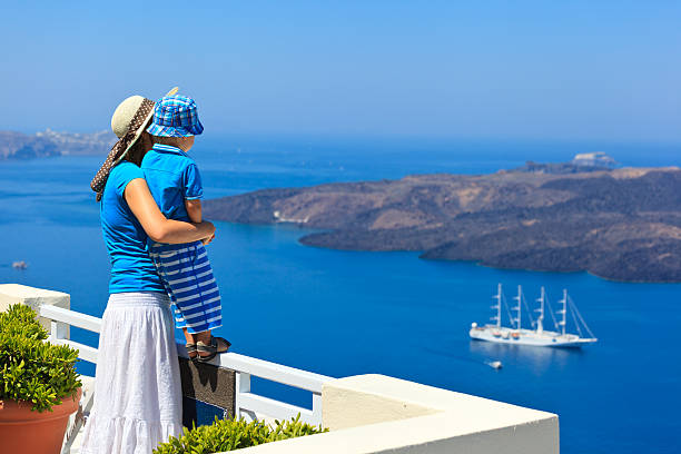 istock mother and son looking at Santorini, Greece 176676670