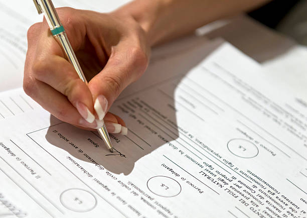 istock Woman hand signing contract 176676762