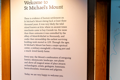 St. Micheal's Mount. Cornwall. UK-10.02.2023. The welcome message to visitors and tourists with some historical information.
