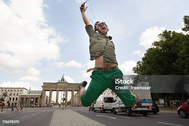 Young Man In Front Of Brandenburg Gate Stock Photo - Download Image Now - 20-24 Years, Adult, Adults Only