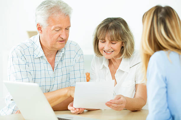 istock Senior Couple Meeting with Financial advisor. 176682150