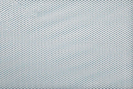 New clean kitchen cooker hood filter background. Closeup. Top down view.