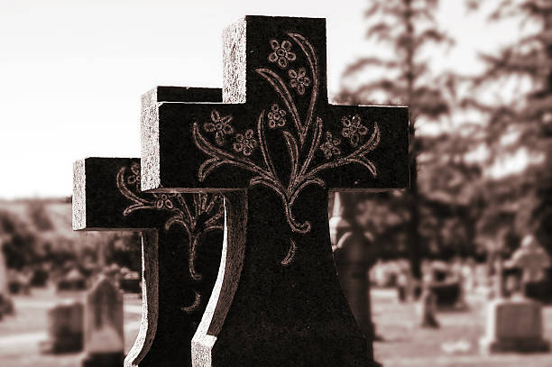 istock Tombstone Cross in Cemetery, Quebec, Canada 176682776
