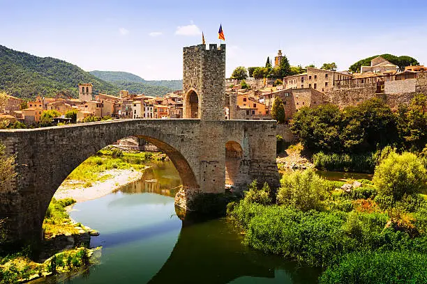 Medieval bridge with antique gate, built in the 12th century. Besalu, Catalonia