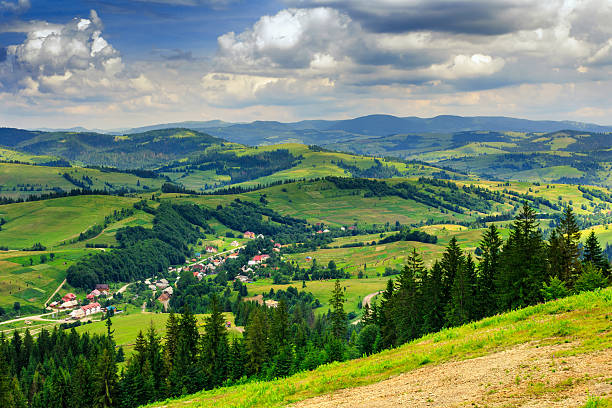 istock panoramic view on village in a hilly valley 176683957