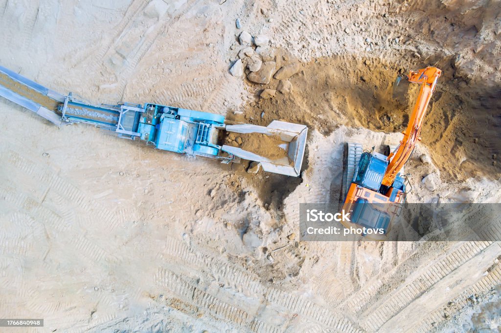 Output Rocks Conveying Crushed Type Rock Crusher Output In An Open Pit Mining A ...