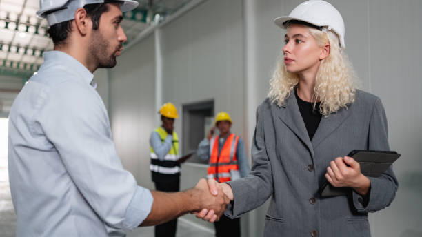 istock Team engineers and foreman stack hand and shake hands to show success at factory machines. Worker industry join hand for collaboration. 1766847179