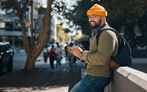 istock Student, portrait and phone in city for college, education or e learning chat, communication and social media on campus. African person typing on mobile for scholarship application or contact outdoor 1766866652