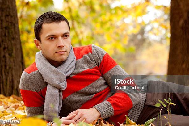 Young Man Enjoing In Autumn Stock Photo - Download Image Now - 20-29 Years, Adult, Adults Only