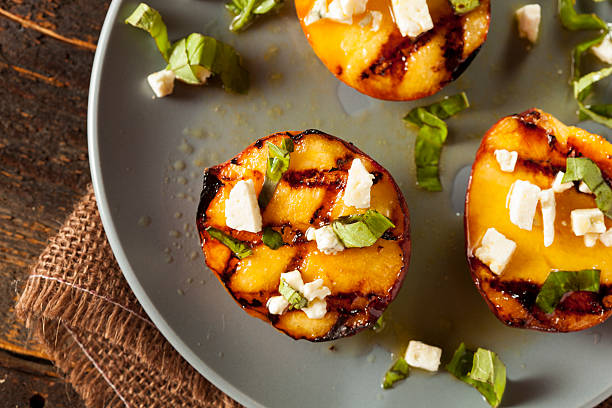 istock Gourmet Roasted Peaches with cheese and basil 176687183