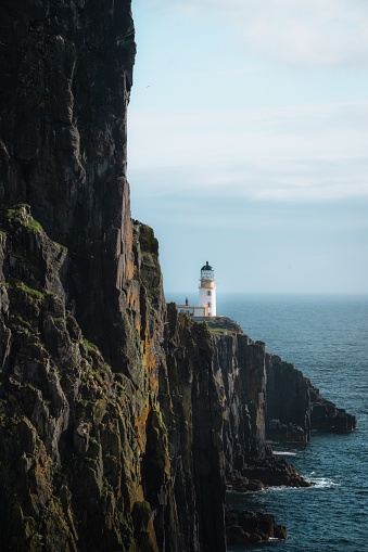 Neist point lighthouse on the Isle of Skye, Scotland, UK.Vertical drone shot. High quality photo
