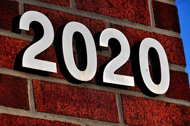istock white 2020 address sign on red brick wall 176692478