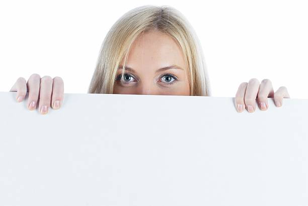 istock Pretty girl behind white board 176696566
