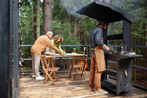 istock Friends having barbecue together outdoors 1766966892