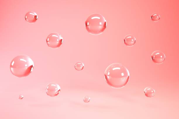 istock Glass bubbles on coral background, abstract surreal 3d render. 1766969852