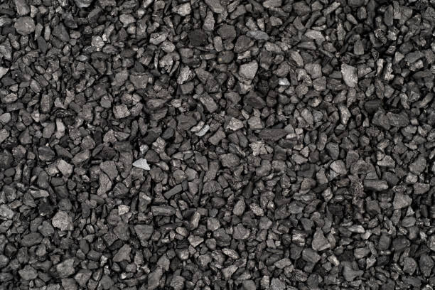 istock Ion-exchange Anthracite for water softening beads or granules texture background. Anthracite water filter for residential drinking or industrial texture,top view 1766970408
